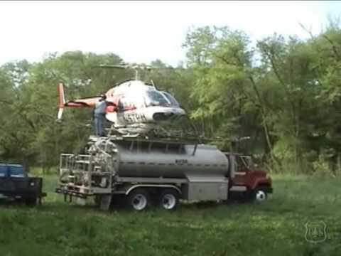 helipad - Provine Helicopters gypsy moth eradication project in Clay Co. North Carolina. Bell 206 IIIB and nurse truck.
