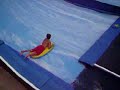 Kid Slips on Surfing ride