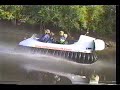 Показаны амфибийные свойства судна на воздушной подушке Hovertrek от Neoteric Hovercraft: движение по льду, траве, воде и песку. Также демонстрируется непотопляемость судна на воде и движение задним ходом.