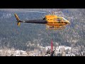 Eurocopter AS-350 with snowmobile sling load.