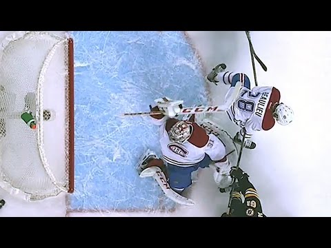 Video: Price reaches backwards to knock away puck