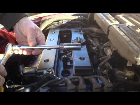 Replacing the Spark Plugs in a 2008 Suzuki Reno