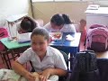 video of a third grade class in tibas, costa rica.  the students don't have textbooks so the teacher draws images on the board each day from her textbook.  the class is half-empty because a dozen students were pulled from class for 15 minutes to go pay for their lunch before their lunch period started (next period).

for more information about my bicycle ride around the world:  www.teacherontwowheels.com