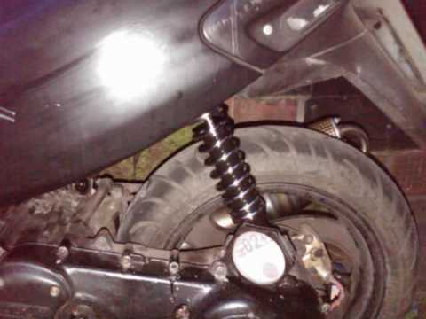 how to adjust ncy rear shock