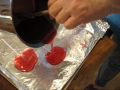 Visit our website: www.marjoriescandies.com Lollipops (Same recipe for Candied Apples) 2 cups sugar 2/3 cups light corn syrup 1 cup water 1/8 tsp. salt Your choice: coloring ( I used a few drops of red) flavoring ( I used strawberry oil) Sticks !. Combine: sugar syrup, water and salt 2. Begin heating to 310 degrees F. and stir just till all sugar is disolved. 3. May occ. stir con't to cook to 310 degrees F. 4. Remove candy from stove and add the color and flavoring. 5.. Place the stick on wax paper allowing enough room for lollipop to spread. 6. Pour candy mixture over the end of the lollipop stick to create the size lollipop you want. 7. Allow to set/cool. For the candied apples: Wash/dry 4 - 5 red tart apples, push a stick in the stem end. When cooking the sugar mixture add a 2 inch cinnamon stick then after it reaches temperature remove the cinnamon stick and add a few extra drops of the red food coloring. Roll the apples in the cooked sugar﻿ mixture and place on a piece of wax paper. Cool and eat....