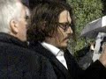 Johnny Depp star of almost every Tim Burton movie shows upto the premiere of the most anticipated Tim Burton film, Alice in Wonderland! Almost everyone wants to see it and the movie looks great, and Johnny Depp as Mad Hatter...well quite frankly, is mad! He shows upto the world premiere in Londons lovely wet rainy weather and signs for everyone. Johnny Depp doesnt believe in letting any fan down, so he goes around everywhere in the whole of the area and signs. He takes awhile, but he gets to you. And if your first/second or third row, your gonna get him.