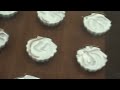 Ann Shortt of Chocolate Belles shows how to make chocolate candies using seashell candy molds. You can use them as embellishments for your cakes, give it to some one in a candy box or even arrange them into beautiful centerpieces.