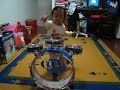 Toddler playing drum