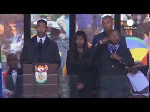 fake - South Africa's deaf community on Wednesday accused the sign language interpreter at Nelson Mandela's memorial of being a fake, who had merely flapped his arm...