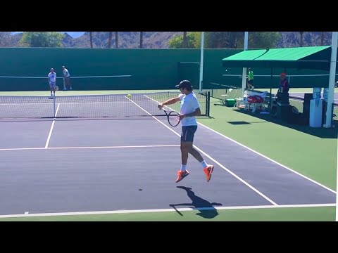 roger - Roger warming up groundstrokes at beginning of video. Roger at net starting 5:40. Roger practicing serves at 8:47. Roger in the front court practicing return...