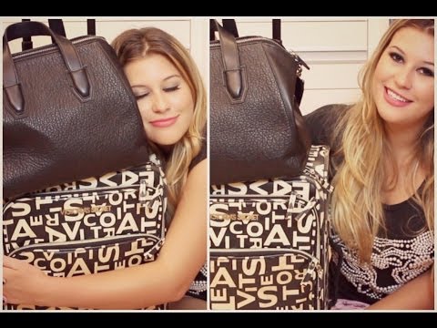 O que tem na minha mala de mão/bolsa de viagem?
