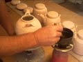 SIMON LEACH - waxing teapots prior to glazing