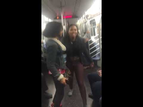 Man smacks the soul out of girl on the NY Subway