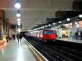 London underground train leaving Gloucester Road station