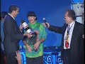 noel lee presenting santana with a monsterous award