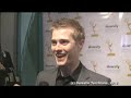 Live from the red carpet at the TV Academy's 'Switched at Birth' screening and panel event, I chat with Lucas Grabeel about what's coming up in the second half of the first season, including what exactly is the deal with Simone, what direction his music will go in, and how he feels about Daphne hooking up with Wilke.