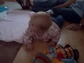 Ruby on her front at 4 months