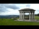 from colley hill, looking to the south-west.  

heavy storm clouds gather, but the storm, and most of the rain, swept away to the east.

the inscription on the folly reads:  
presented to the corporation of the borough of reigate for the benefit of the public by lieutenant-colonel robert william inglis in 1909.

see sepatare video for the mosaic under the roof.