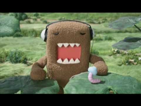 domo - Domo listens to his headphones.