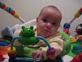 Lilie in the Baby Einstein Jumper - 11 weeks