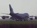 A landing of a Great Wall Airlines Boeing 747-400 REG B-2428.The runway is the polderbaan at Amsterdam schiphol.