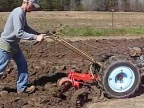 david bradley tractor - The David Bradley Super 575 pulling the disc harrow through the garden for the 2013.