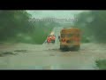 Bus drives through flooded road