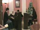 jonathan & jennifer mason perform variations on a theme by paganini by witold lutoslawski in a piano recital in their home on november 24, 2007