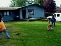 Grampy playing catch with grandkids