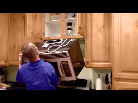 how to remove over the range microwave