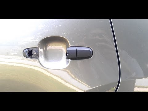 Repairing a Toyota Matrix Door Handle & remove door panel