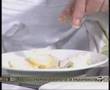 Patatas a la importancia con almejas en salsa verde