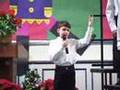 PS22 Chorus 4th grader Justin sings I Wonder As I Wander WOW