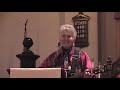 Feminist folk singer, Sandy Rapp, sings a new song, 