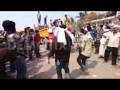 Chaotic scene as volunteers carry away corpses in ...