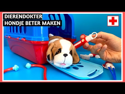 Dierendokter maakt Hondje beter uitpakken en spelen