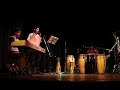 la banda de latin tocando el tema 