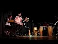 la banda de latin tocando el tema 