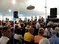 dirk powell, riley baugus, jesse wells, & brett ratliff from east ky, singing about noah as the rain was puring down outside! i'm suprised the whole tent didn't blow away!