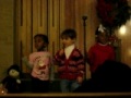 Nicky's 1st Christmas Play Alternately singing jingle bells and staring at the crowd in wonderment :) My precious 3 year old in his first little play! I love you Nicky!!!