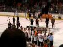 the omaha lancers captain chris hepp takes the ushl championship trophy (clark cup) around the rink before passing it on to a teammate.