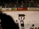 the omaha lancers captain chris hepp takes the ushl championship trophy (clark cup) around the rink before passing it on to a teammate.