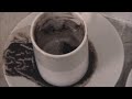Thea Djordjadze, untitled [\"WahrSagen Kaffeesatz\"], performance, 2000