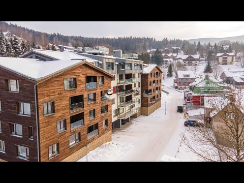 Video Moderní apartmán s garážovým stáním v projektu Luční dům – Špindlerův Mlýn