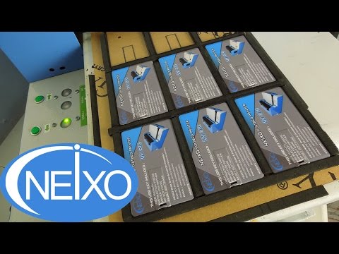 Eco Solvent Ink flatbed printer printing on Batch of USB cards