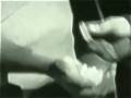 videos de Bruce Lee Lighting Matches with Nunchucks