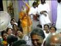 Amma-watches-devotee-sing---2007