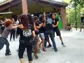 axe grinder performing walk by pantera at roccolo park festival sangiustino with crazy audience