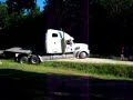 My friends dad gets his rig stuck in a ditch and the good old pickup truck comes to the rescue.