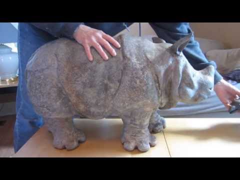Clay - http://UltimatePaperMache.com - This is how the Indian rhino sculpture came out. She was coated with Sculpt Nouveau iron coating, sprayed with Tiffany Green ...